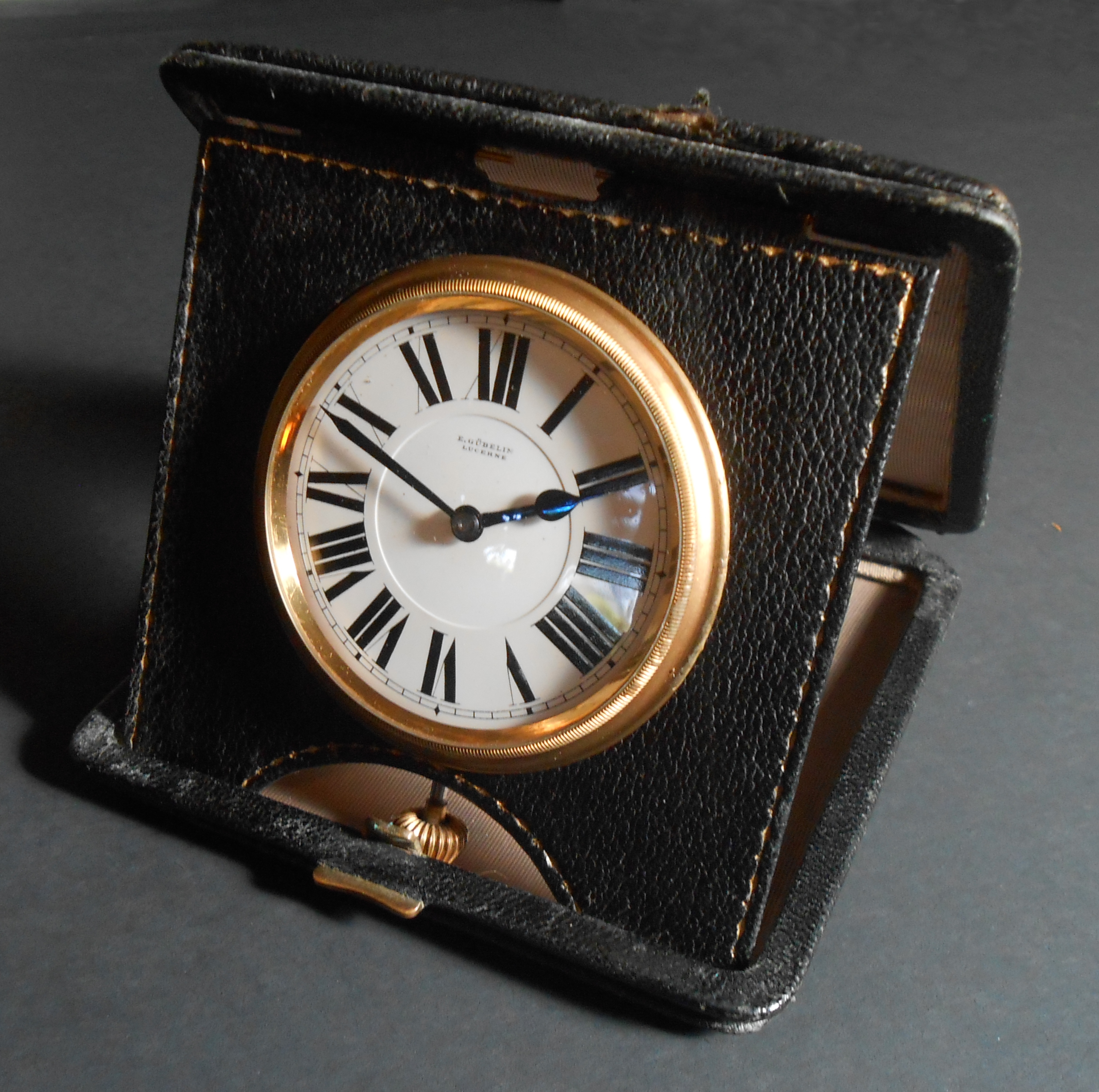 Octava movement High end travel by upon | a Gubelin Once 1920 time circa clock